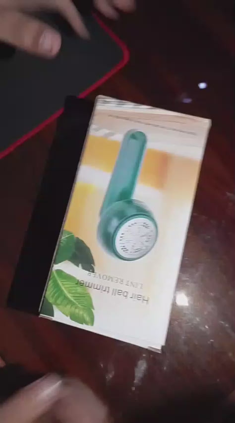 Demo video of the rechargeable lint remover removing lint from clothes
